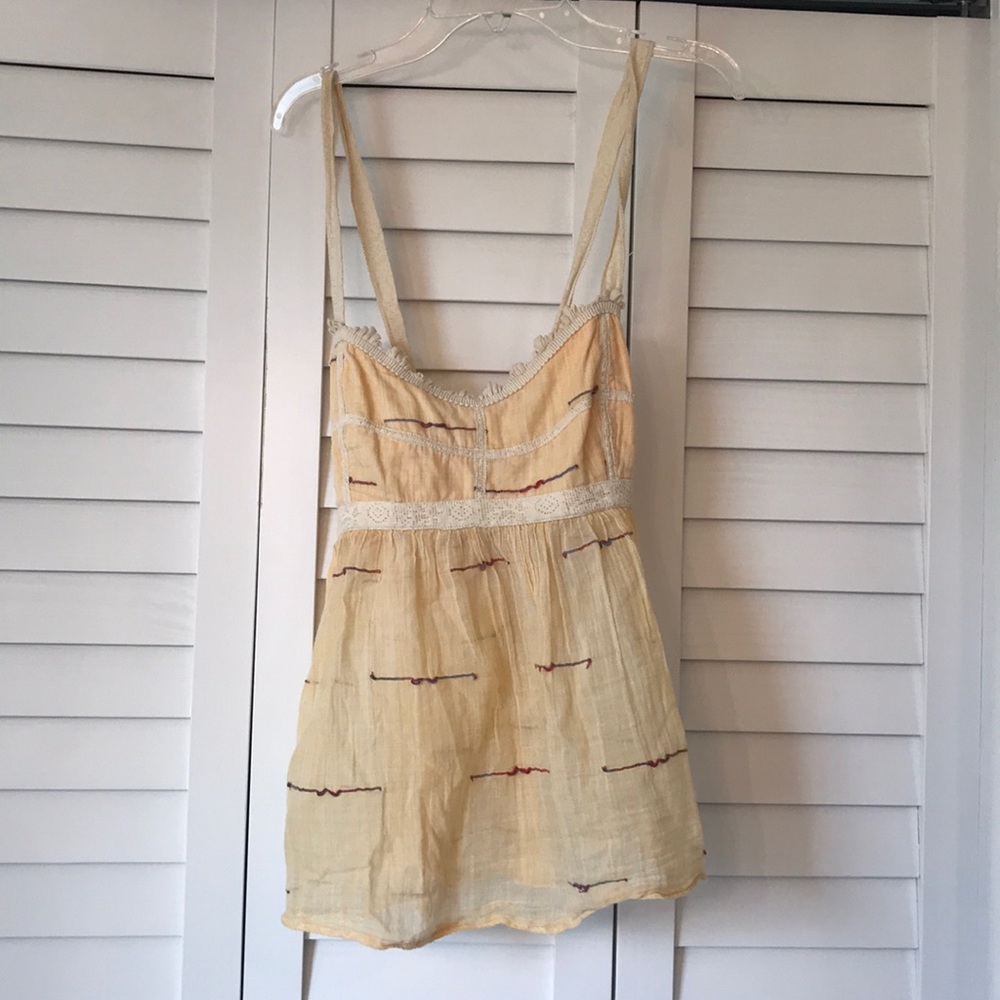Yellow tank top with detailing